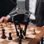 Futuristic AI robot arm making chess move during a game with a human player.