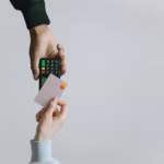 Modern contactless payment using a card and terminal, highlighting the ease of digital transactions.