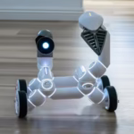 Close-up of a wheeled robot toy with a spotlight in an indoor setting, showcasing modern technology.